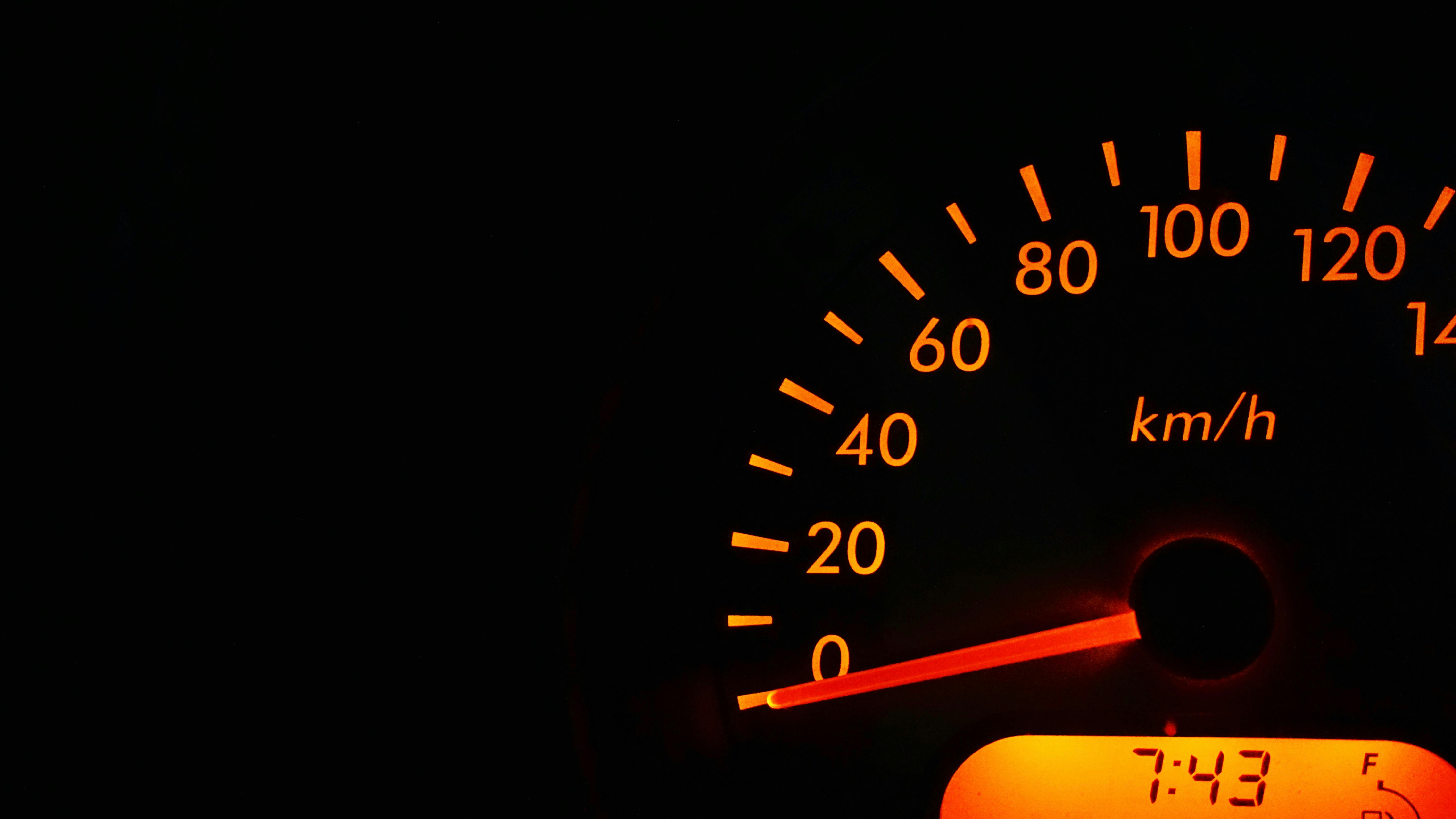 Car Speedometer Dashboard at Night 