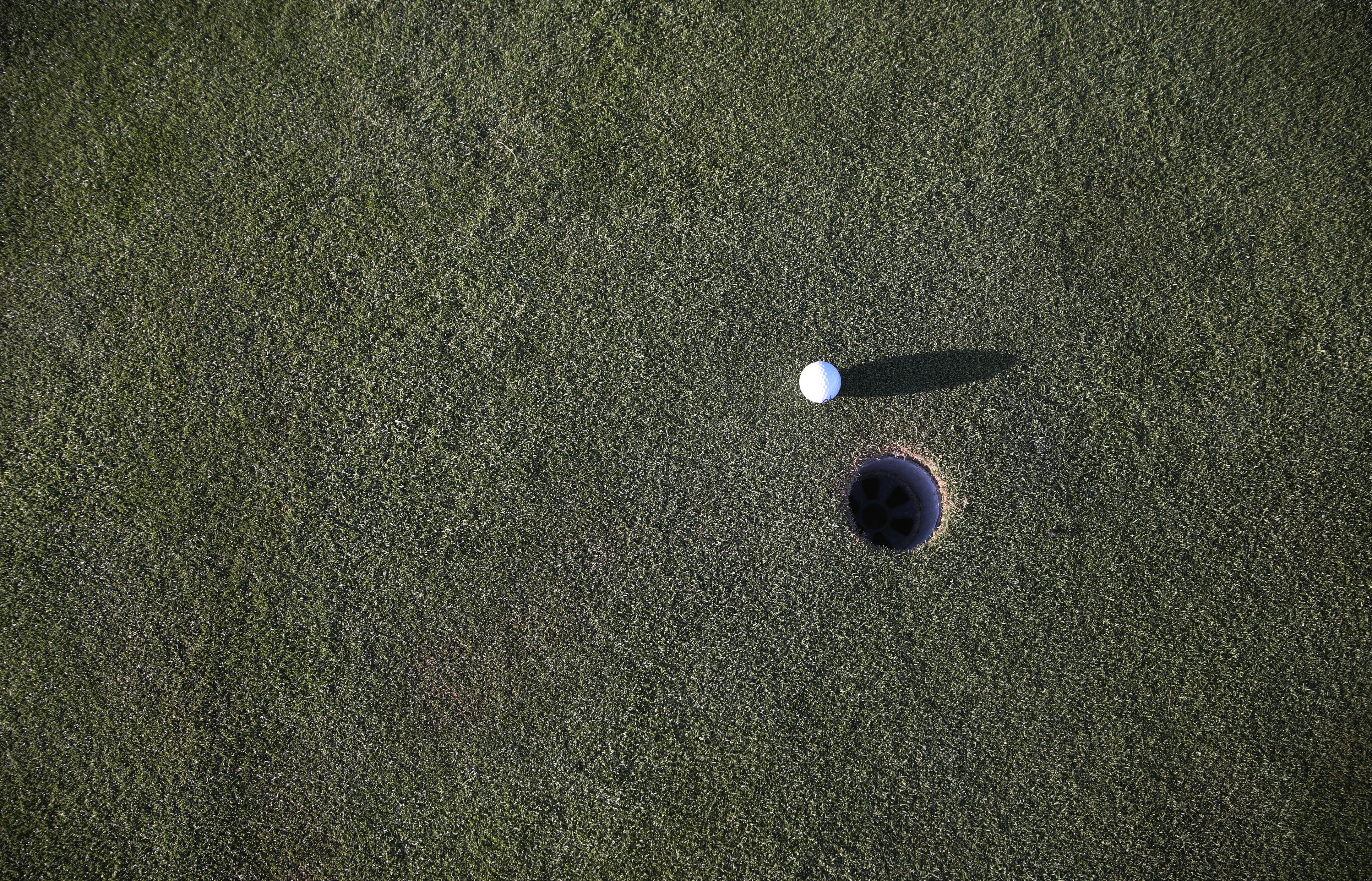 Golf Ball Near Hole